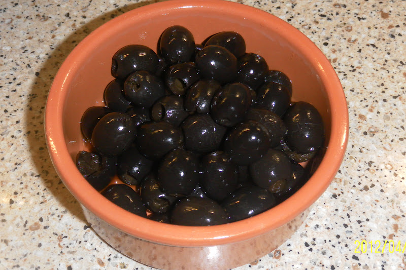 FLOWER POT KITCHEN HOME GROWN BLACK OLIVES, BRINED FOR 6 MONTHS & MARINATED IN GARLIC & CHILI