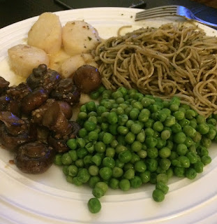 scallops, sauted mushrooms, green peas and pasta with pesto