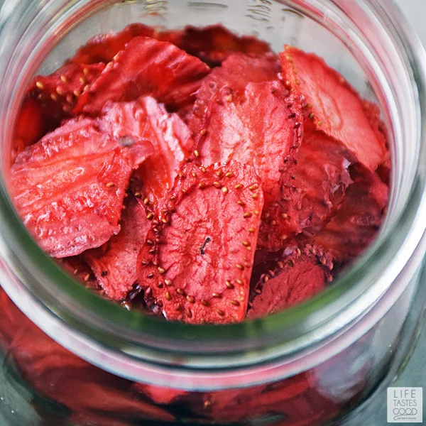 Dried strawberries stored in a mason jar
