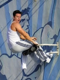 Pain and Gain - Mark Wahlberg doing some harness-enhanced wall sit-ups.