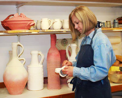 Cheryl Ross Ellingson at work in her ceramics studio