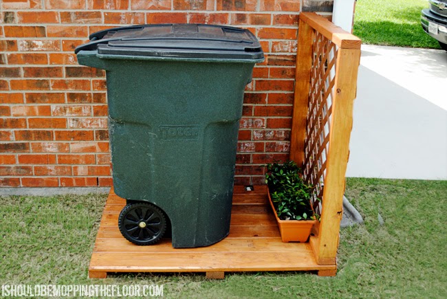 Outdoor Garbage Can Storage  i should be mopping the floor