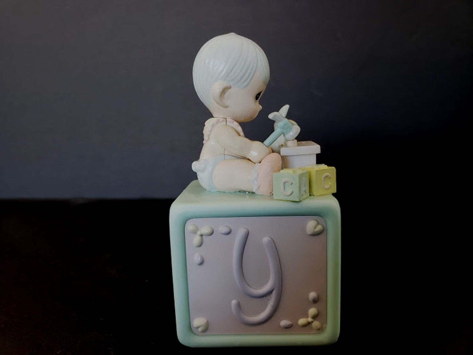 Enesco musical animated baby figurine