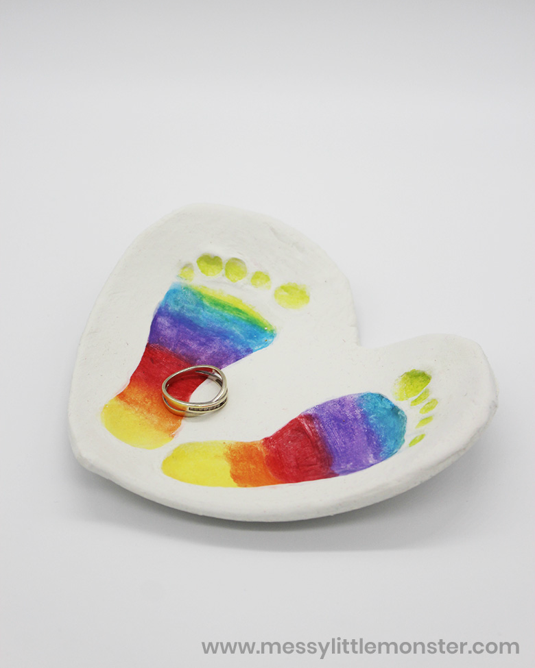Clay Baby Footprint Art with rainbow footprints! Messy Little Monster