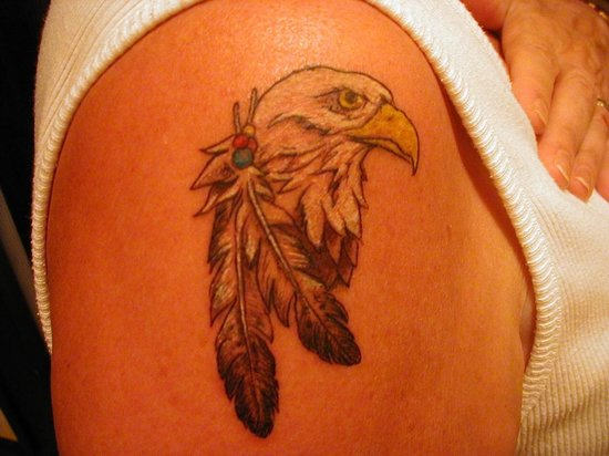 9. Eagle Feather Tattoos - wide 2