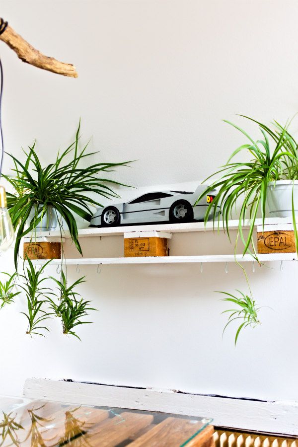 white Wild Horse iconic sports car displayed on shelf