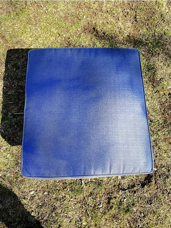 spray painting the cushion navy blue