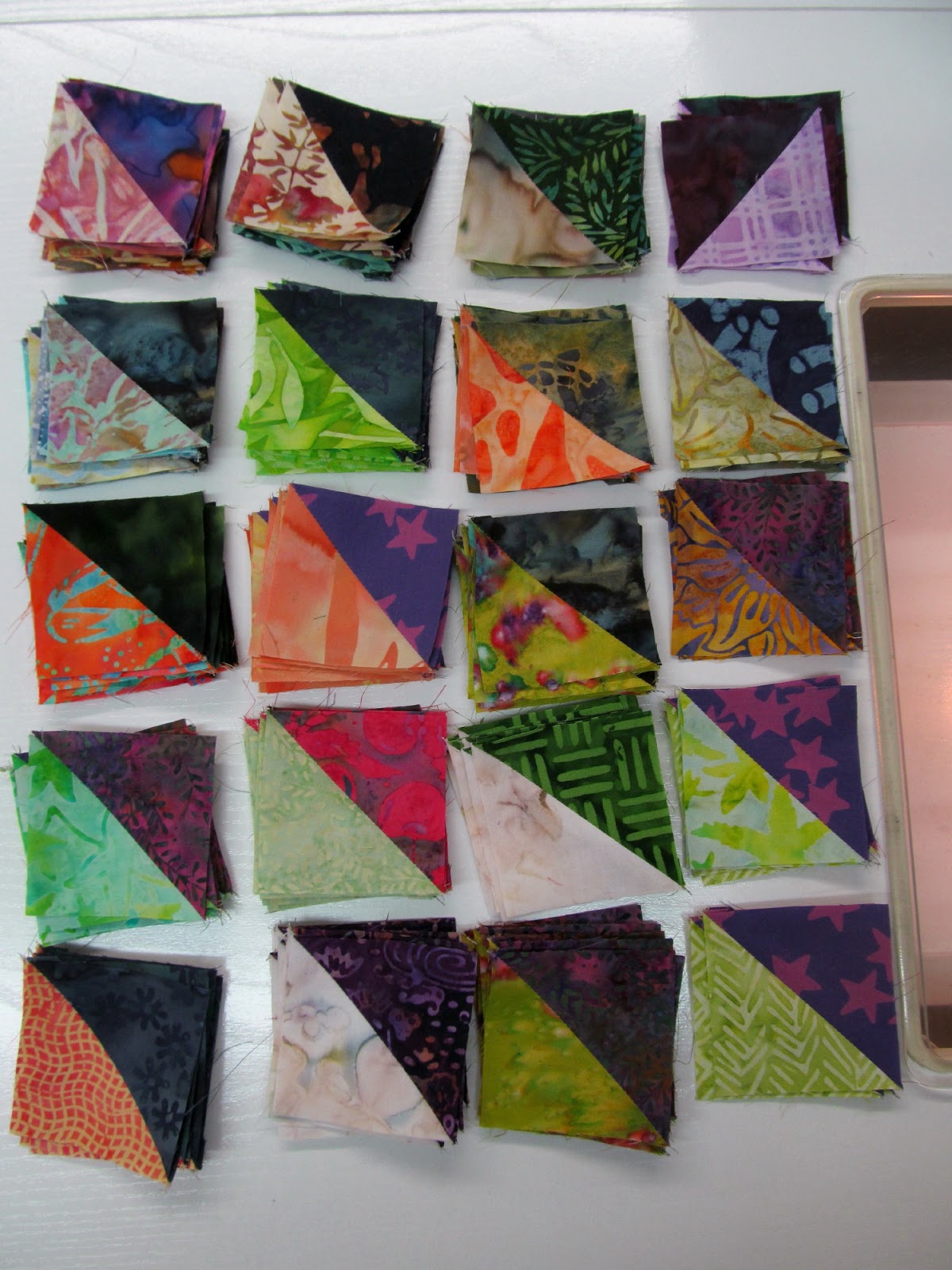 Exuberant Color : Basting and more triangle squares.........
