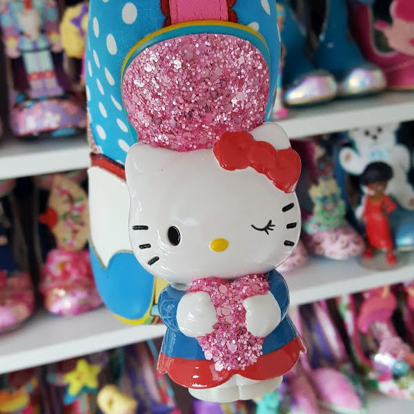 Hello Kitty shaped character heel on boot in front of shoe room