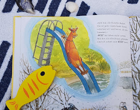 Mama Muh und die Küstenkinder spielen Sommer: Kinderbuch-Rezension und unsere Top 5 Ideen, um den Sommer ins Haus zu holen. Die lustige Kuh nimmt die Kinder in diesem Buch mit in den Sommer.