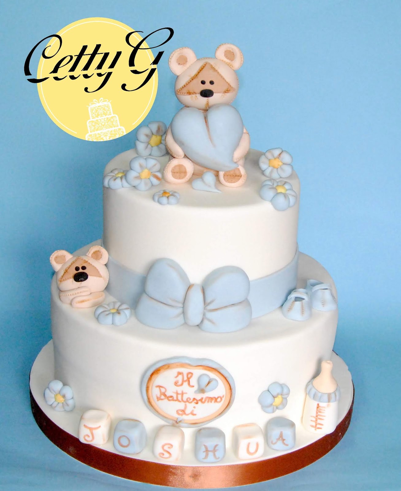 Torta decorata per il 1° compleanno di un bimbo con orsetto e