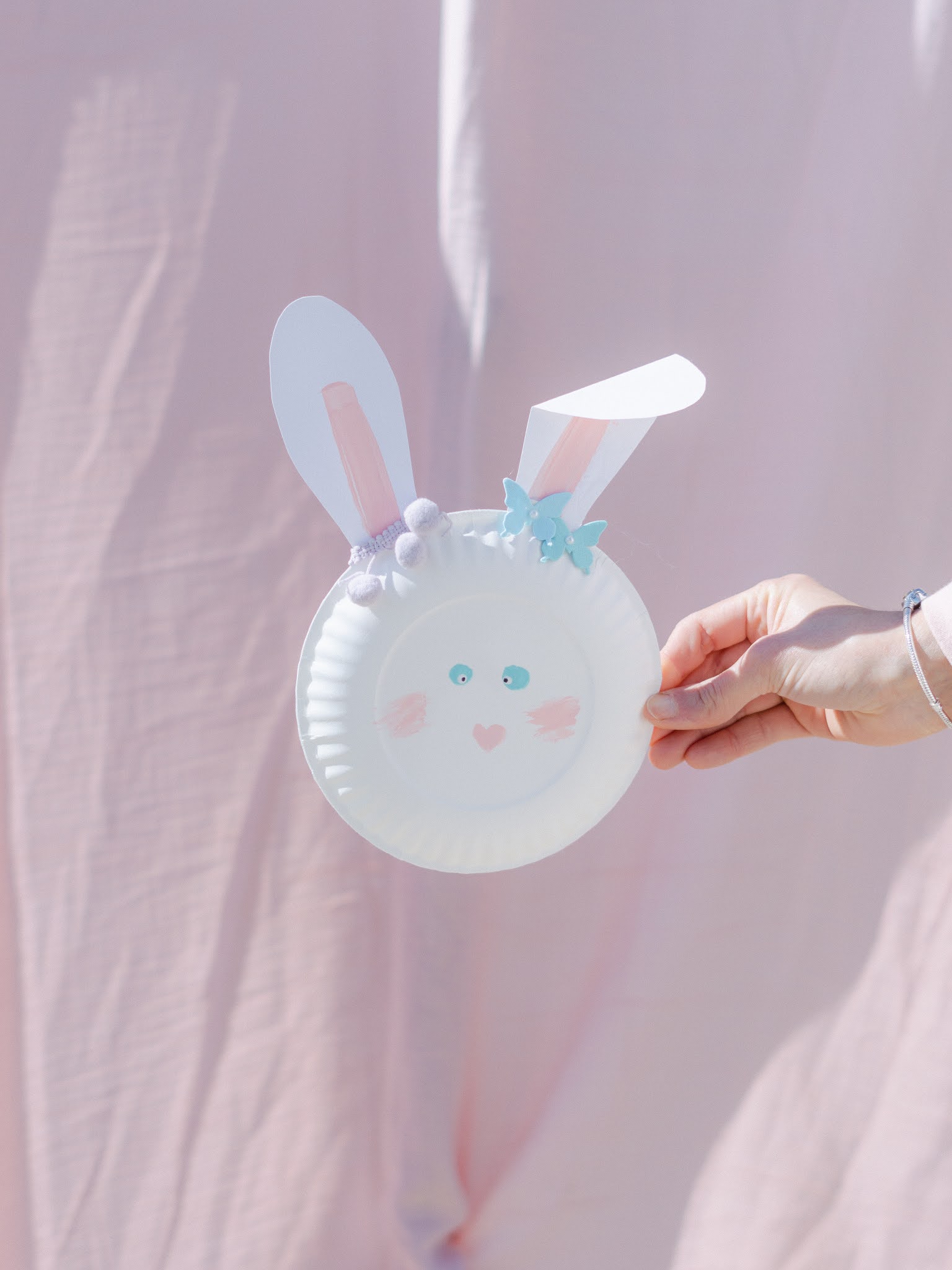 Paper bunny plate craft is a whimsical Easter craft