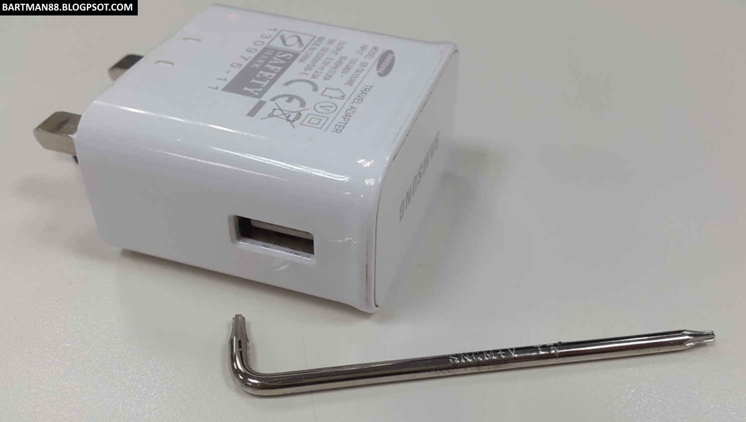 how to open samsung travel adapter
