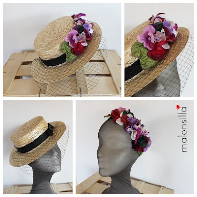 Canotier en negro con velo, y flores buganvilla, rosa y lila desmontable que se convierte en diadema de flores