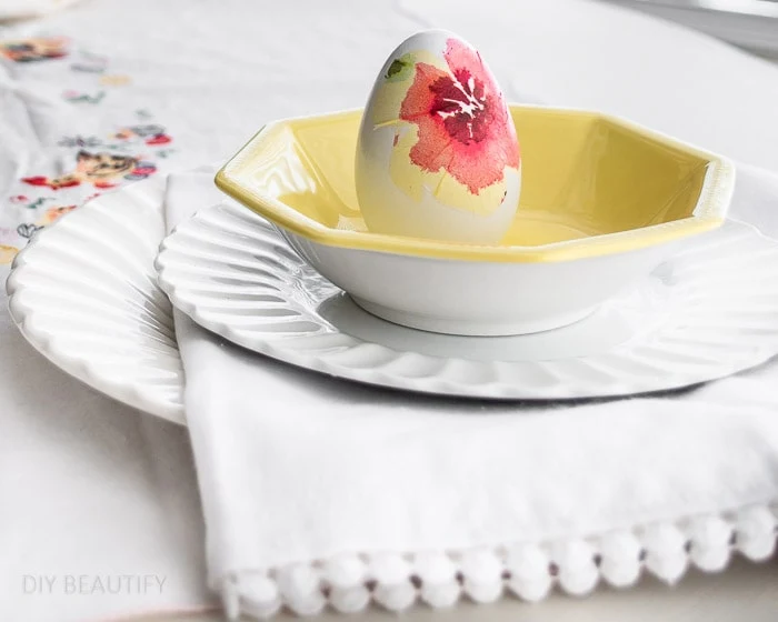 decoupaged Easter egg in daffodil yellow ironstone