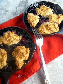 Try this Cast Iron Summer Berry Cobbler before the abundance of summer berries dissapear!  Perfect for Labor Day - Slice of Southern