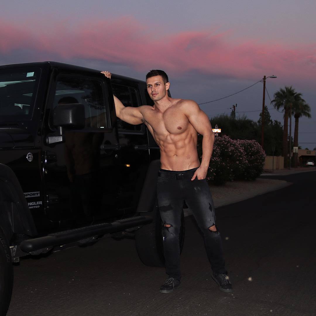 cocky-muscular-shirtless-bro-luxurious-black-car-hunk