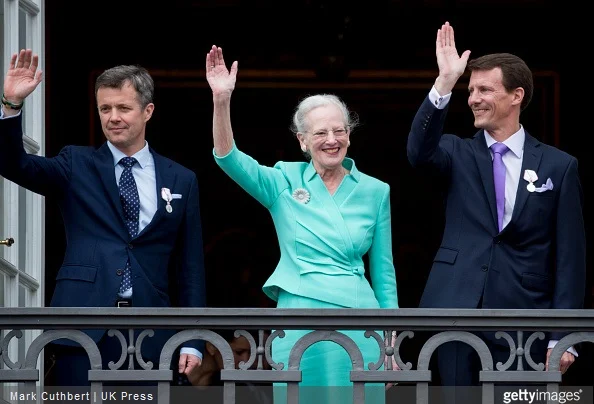 Queen Margrethe II of Denmark with Crown Prince Frederik of Denmark and Prince Joachim of Denmark on the balcony at Amalienborg Palace during festivities for the 75th birthday of Queen Margrethe II Of Denmark