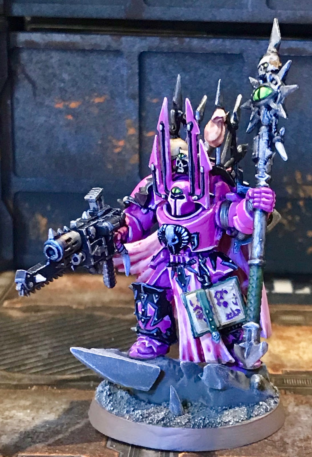 *Chaos marine walks in holding a banner of this image up with both