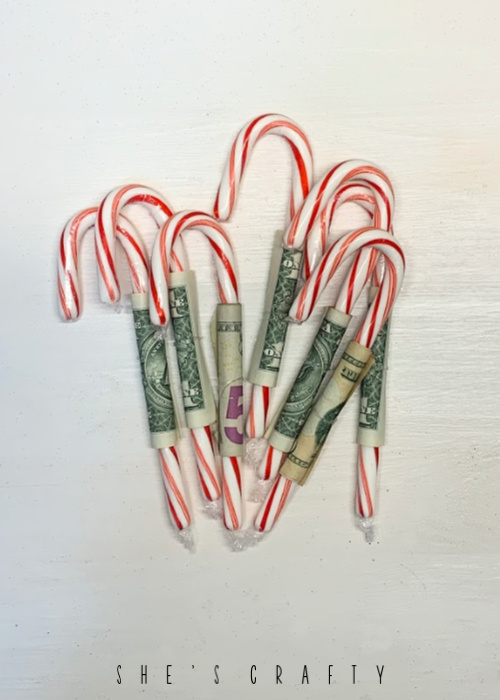 Creative way to give money for Christmas -money wrapped candy canes