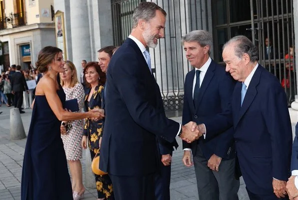 Queen Letizia wore Pedro del Hierro jumpsuit and Nina Ricci pumps, carried Felipe Varela clutch bag