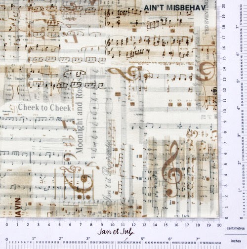 Tela patchwork con motivos musicales