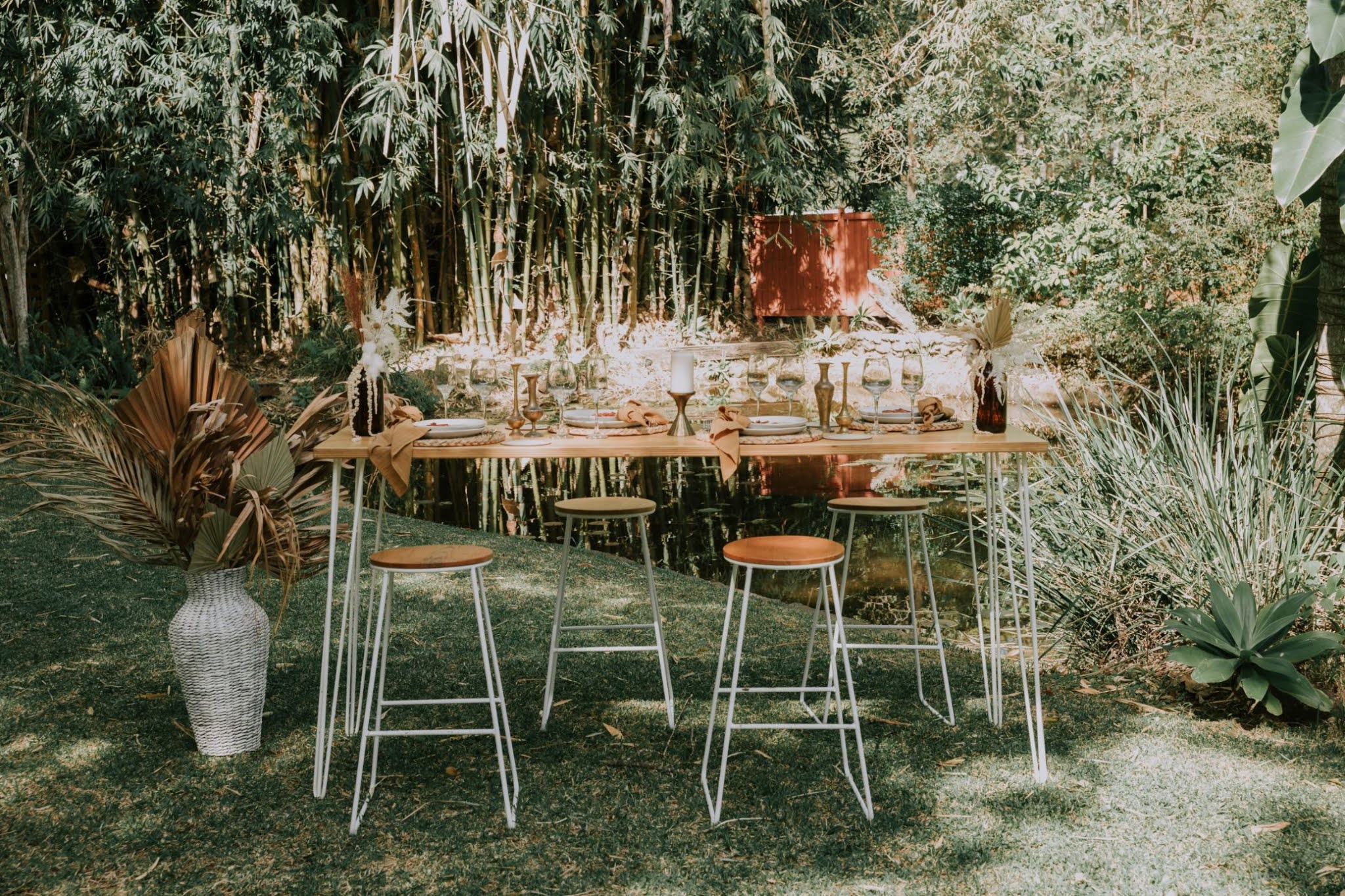 to the aisle australia | luxe bohemian weddings gold coast Atomic Butterfly Photography florals leather couch hat cake venue styling