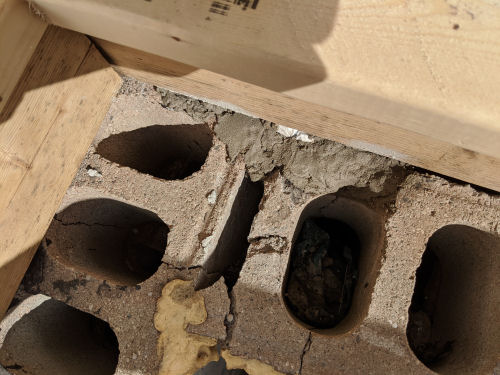 repaired hole in a block wall