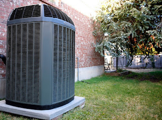 HVAC unit kept in the backyard of a house