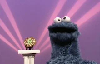 Cookie Monster sings Cookie Monter's R Rap in Letter of the Day segment. Sesame Street All Star Alphabet