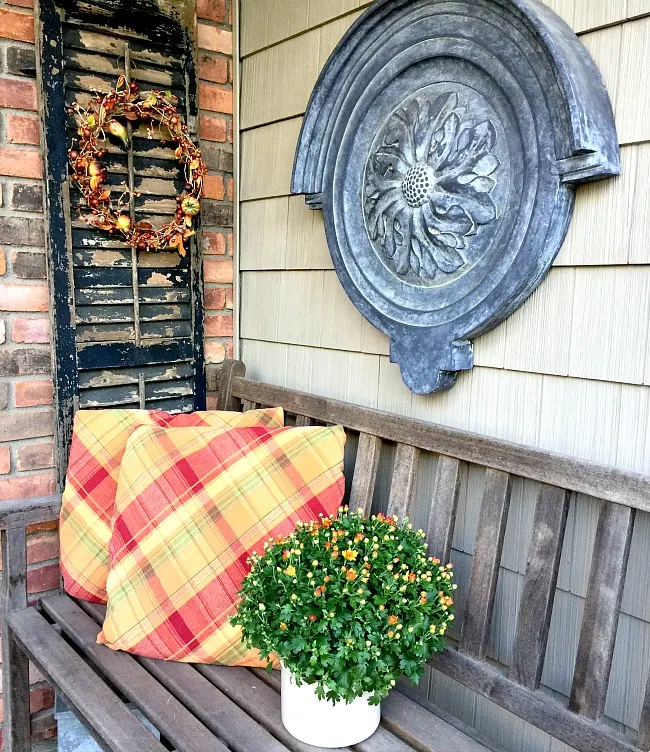 Fall front stoop pillows and flowers