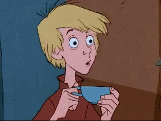 Arthur from Disney's Sword in the Stone, looking quite surprised and holding a teacup
