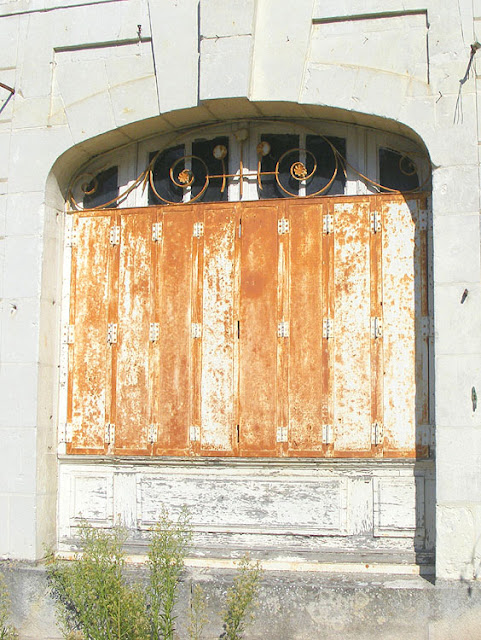 Old metal window shutters. Indre et Loire. France. Photo by Loire Valley Time Travel. Old metal window shutters. Indre et Loire. France. Photo by Loire Valley Time Travel.