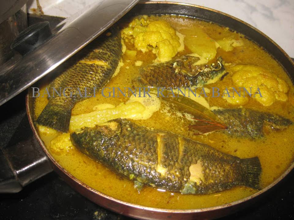 Jo Cooks Koi Macher Jhol(Fish curry with Vegetables)