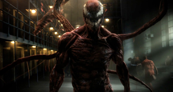 Carnage walks through a prison in VENOM: LET THERE BE CARNAGE.