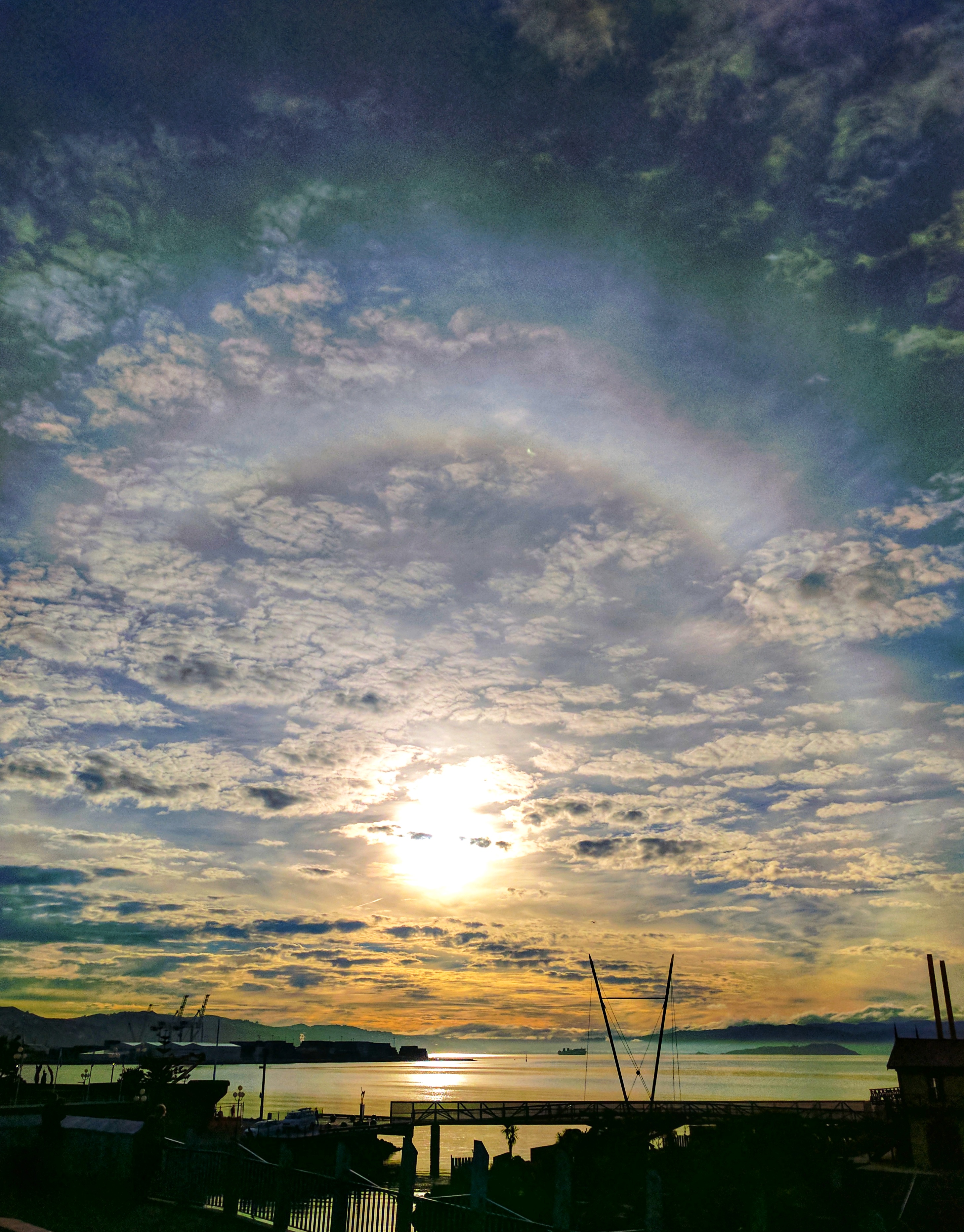 Sunrise rainbow from The City To Sea Bridge in Wellington