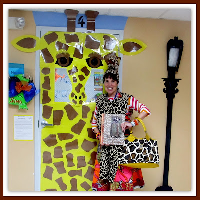 Debbie Clement, author of "Tall Giraffe" with decorated classroom door