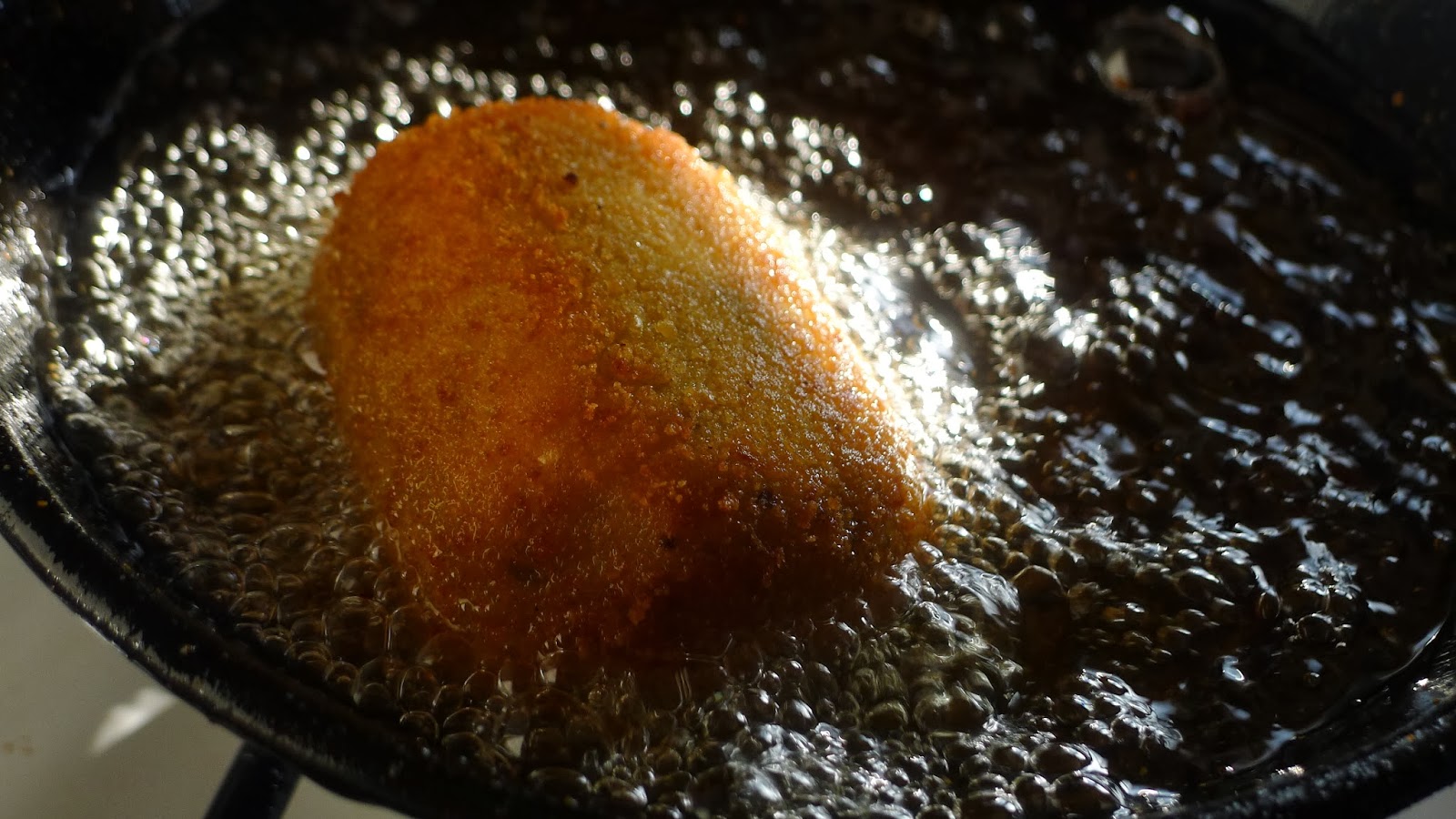 Bread and olives Indian spiced scotch egg