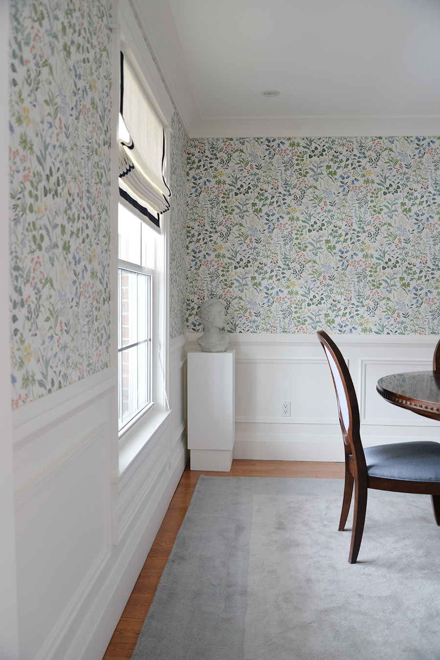 traditional dining room, oval back chairs, head planter, pedestal, Scandinavian floral wallpaper, moulding, wainscotting traditional dining room, oval back chairs, head planter, pedestal, Scandinavian floral wallpaper, moulding, wainscotting