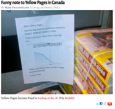 Pile of Yellow Pages books with note posted next to it saying they should get a new business model and showing a graph of their stock price, which goes straight down