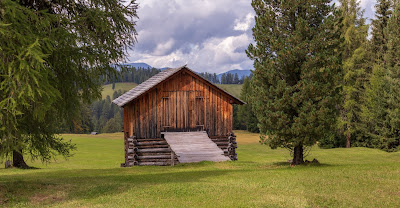 In the Prati d'Armentara and typical Tyrolean Barn.