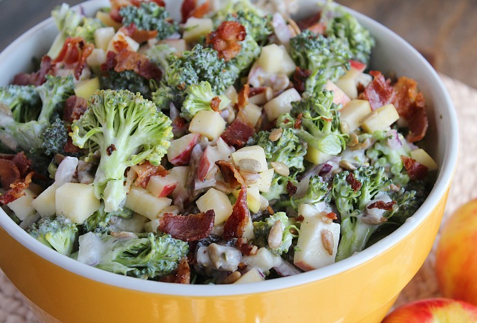 A lightened up twist on a family favorite recipe. Crunchy Honeycrisp apples are paired with broccoli, sunflower seeds, raisins and bacon—a perfect dish to bring to a cookout or party!