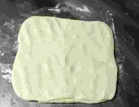 Flatten dough for amritsari kulcha