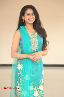 Actress Nithya Pictures in Green Salwar Kameez at Nandini Nursing Home Audio Success Meet  0002