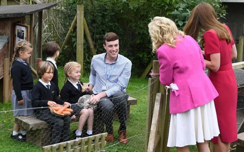 Kate Middleton wore a new midi pencil dress from Alexander McQueen. US First Lady Jill Biden wore a pink tweed blazer from L'agence