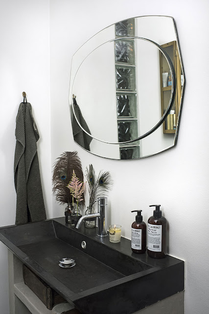 Black & White apartment in Copenhagen with interesting metallic contrasts