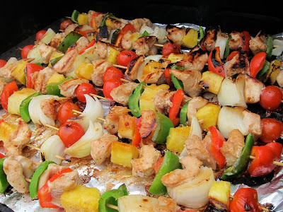 These Hawaiian Chicken Kabobs are bursting with delicious flavor. The combination of sweet and sour, coupled with juicy chicken, are a winning summer dinner. #WomenLivingWell #kabobs #grill #easydinner