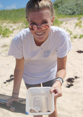 Ocean Academy Intern Caroline Alexander collecting microplastics from a Bermudian beach.