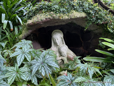 Madonna and Child statue in grotto at Lake Shrine Meditation Gardens in Pacific Palisades, California