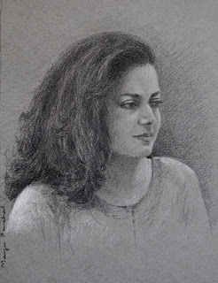 Portrait study on Strathmore gray toned paper using graphite pencil